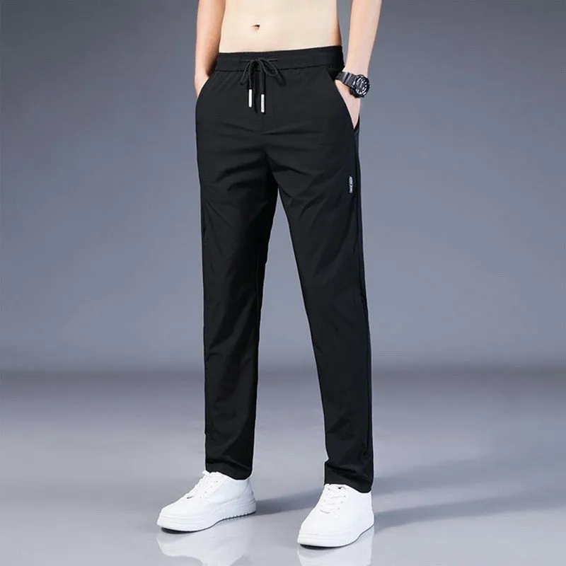 2022 Men&#39;s Casual Trousers Spring Summer Solid Color Fashion Pocket Applique Full Length Casual Work Pants Straight Pantalon