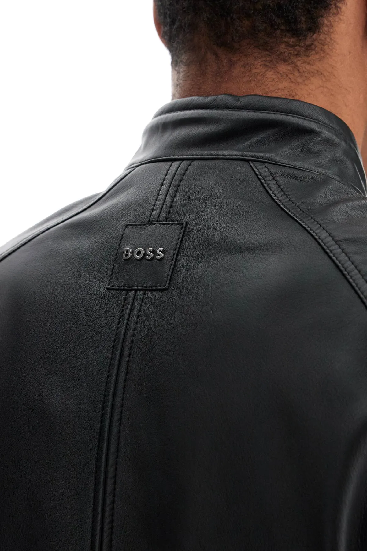 BLACK LEATHER JACKET WITH HIGH COLLAR AND QUILTED DETAILS